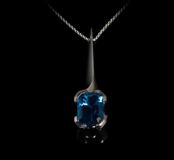 Palladium pendant set with blue topaz